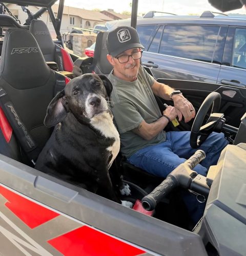 Bella riding in the RZR with Jason